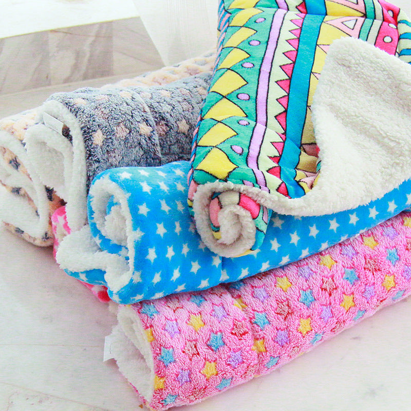 Fleece pet blankets in geometric and star patterns