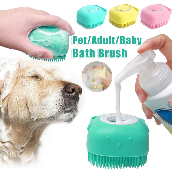 Dog being washed with the green silicone bath brush