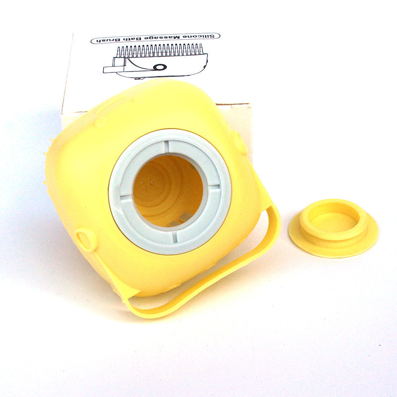 Yellow bath brush with the shampoo reservoir cap open