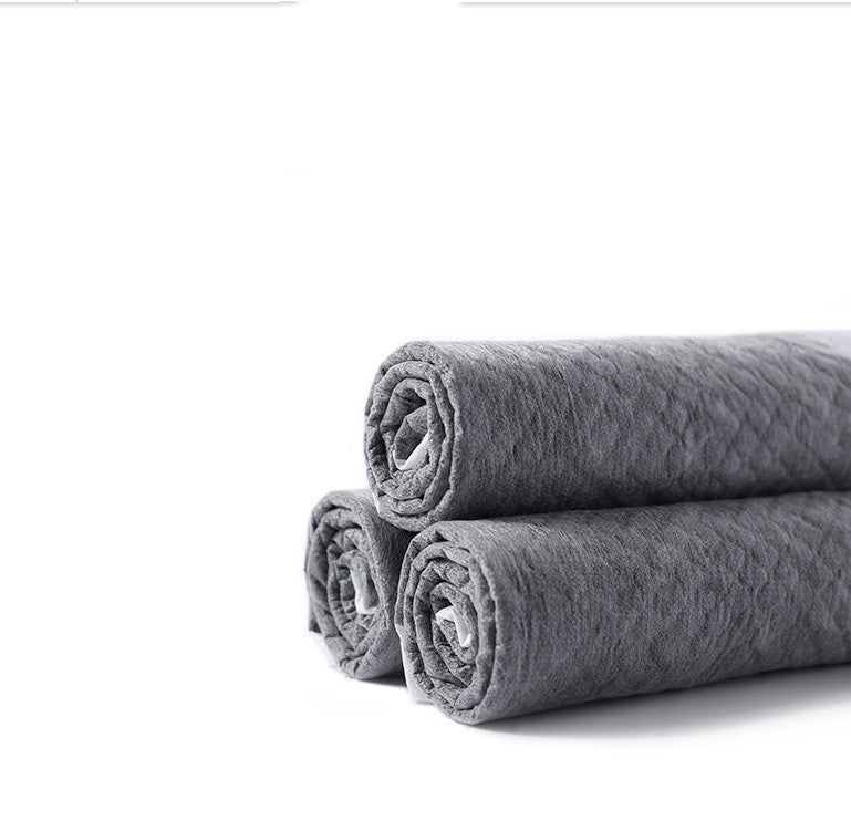 Three rolled gray bamboo charcoal pee pads